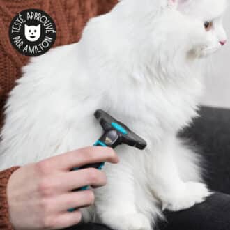 Brosse carde anti mue Trixie pour chat et petit chien