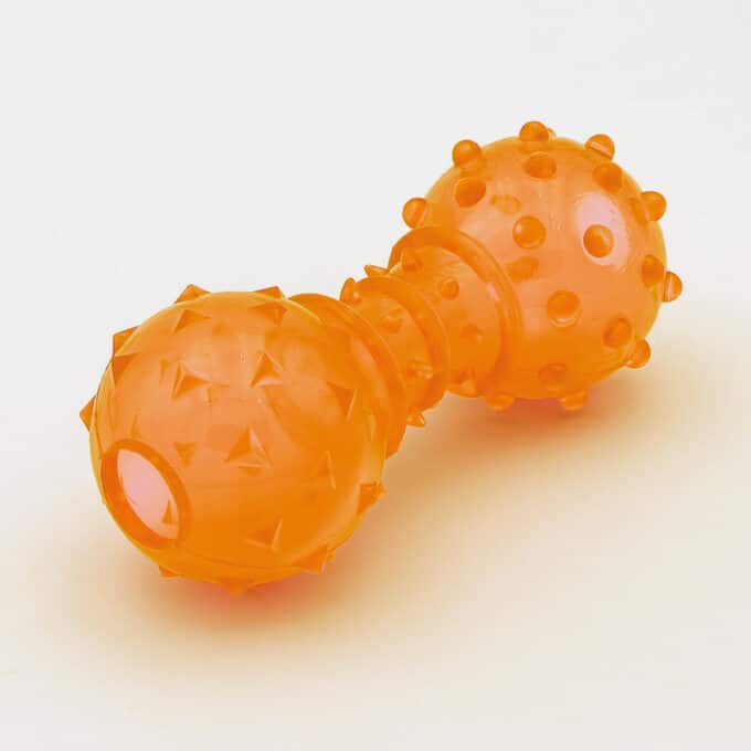 distributeur-macher-croquettes-friandises-chien-1 Distributeur transparent pour chien avec picots en forme d'haltère