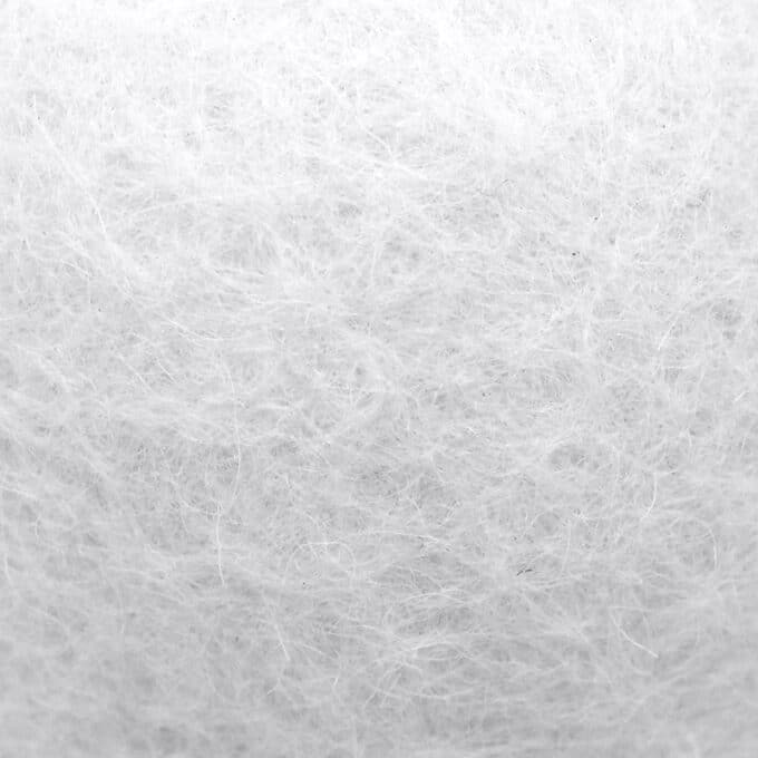 Balle blanche en laine compactée pour chat