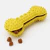 os-caoutchouc-distributeur-croquette-chien-1 Jouet en caoutchouc pour chien distributrice de croquettes jouet anti-glouton